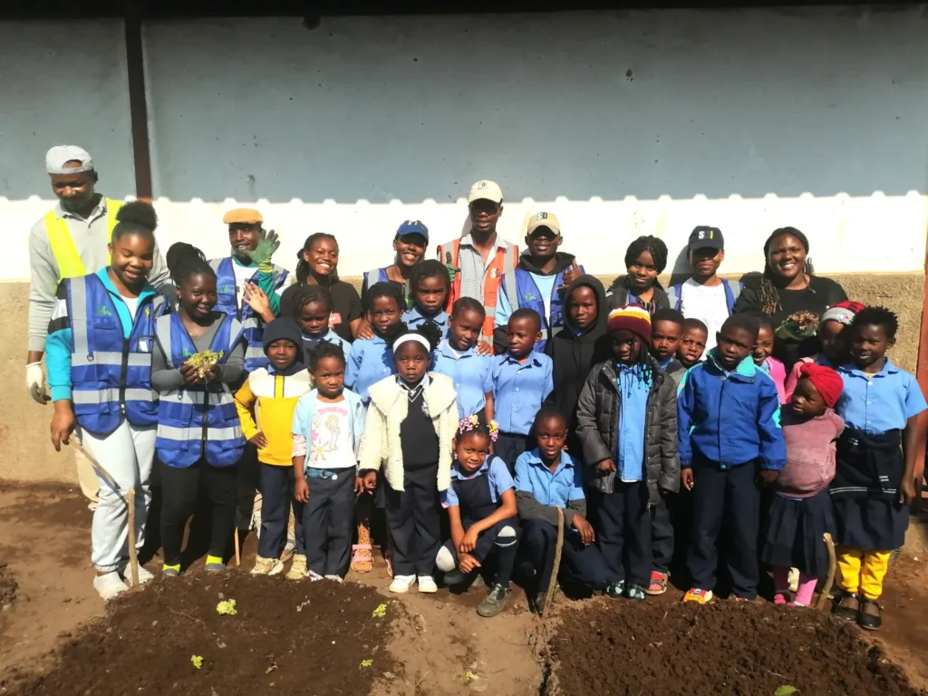 Group photo of children with instructors