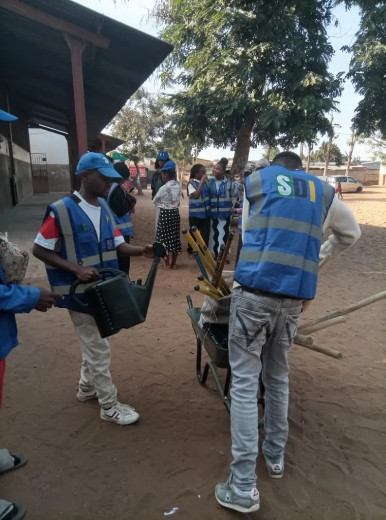 Volunteers with equipment during an environmental protection activity